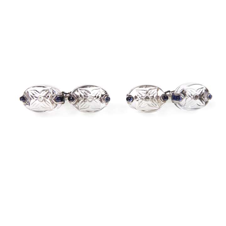 Pair of rock crystal and sapphire cufflinks of ovoid form